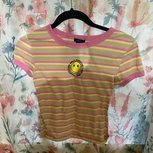 striped shirt with smiley face